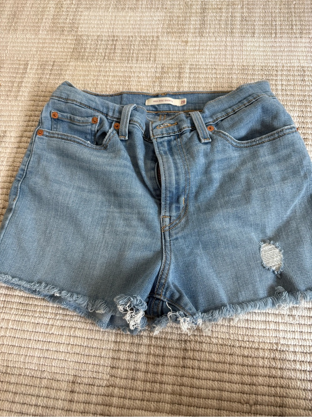 Levi's light blue distressed denim cutoff shorts